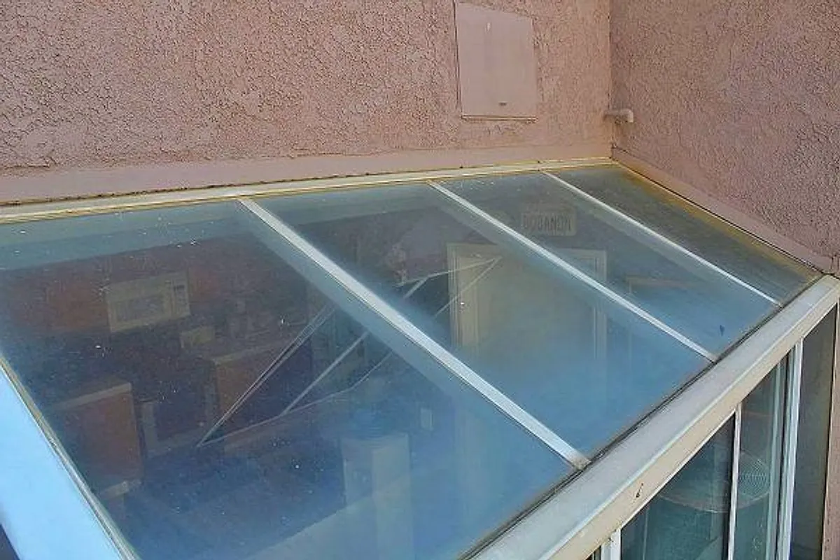 Exterior window cleaning on a Murrieta home — before