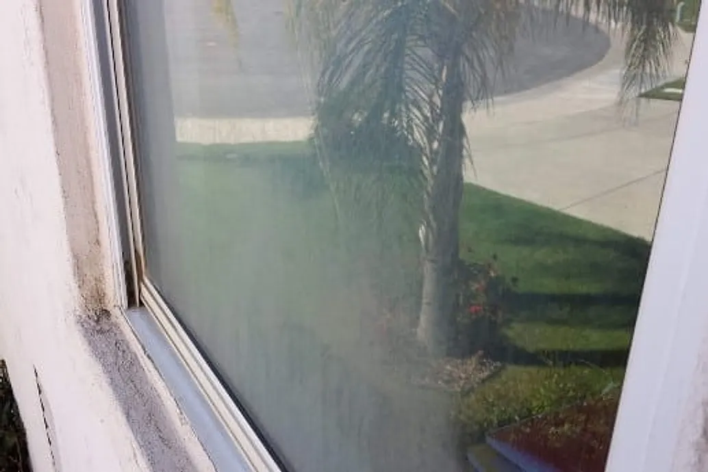 Interior window cleaning on a Murrieta home — before