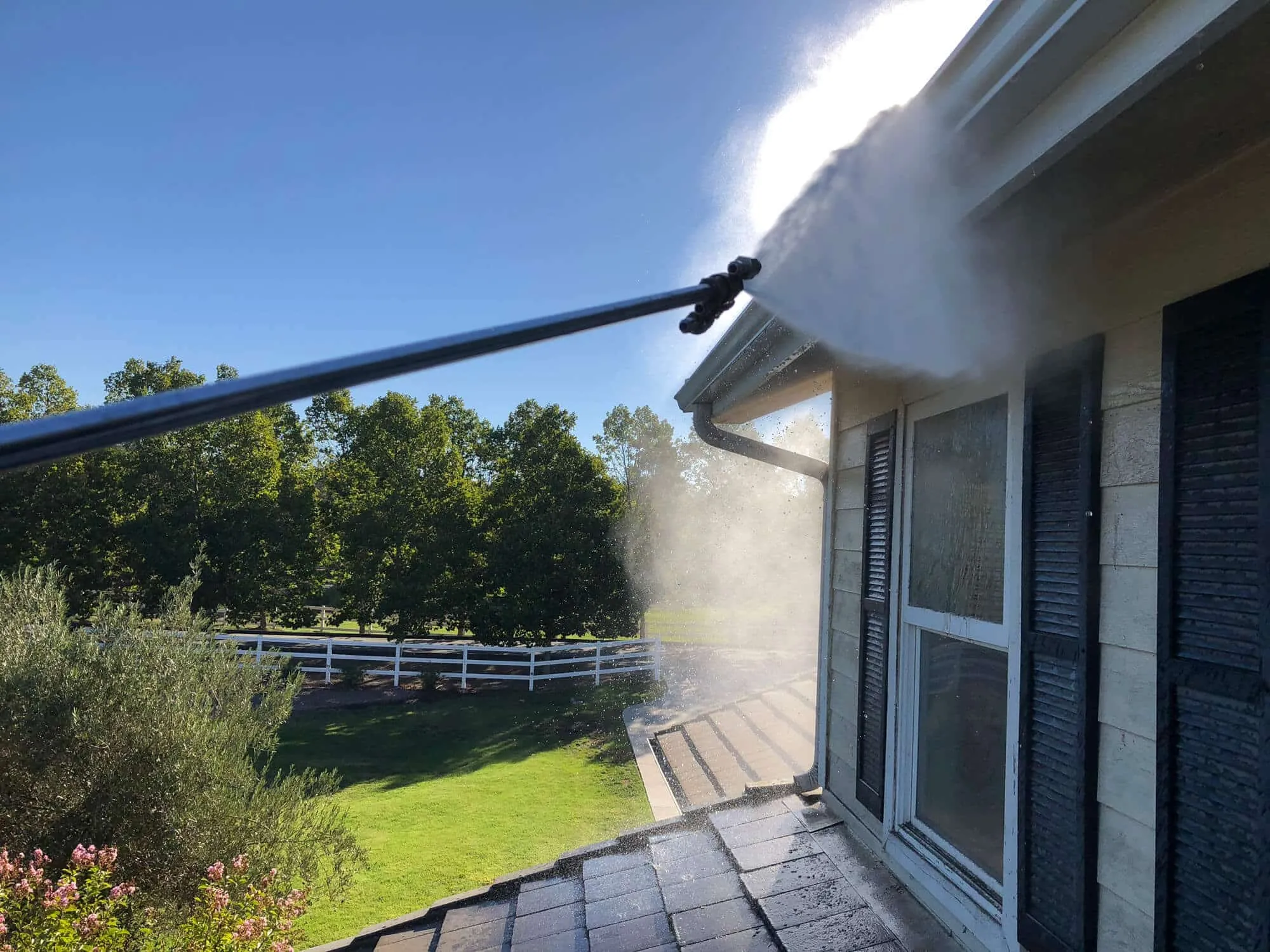 Pressure washing a driveway at a Murrieta home