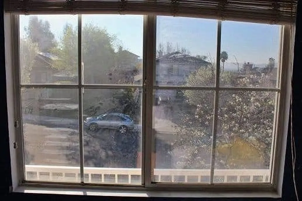 Residential window cleaning on a Murrieta home — before