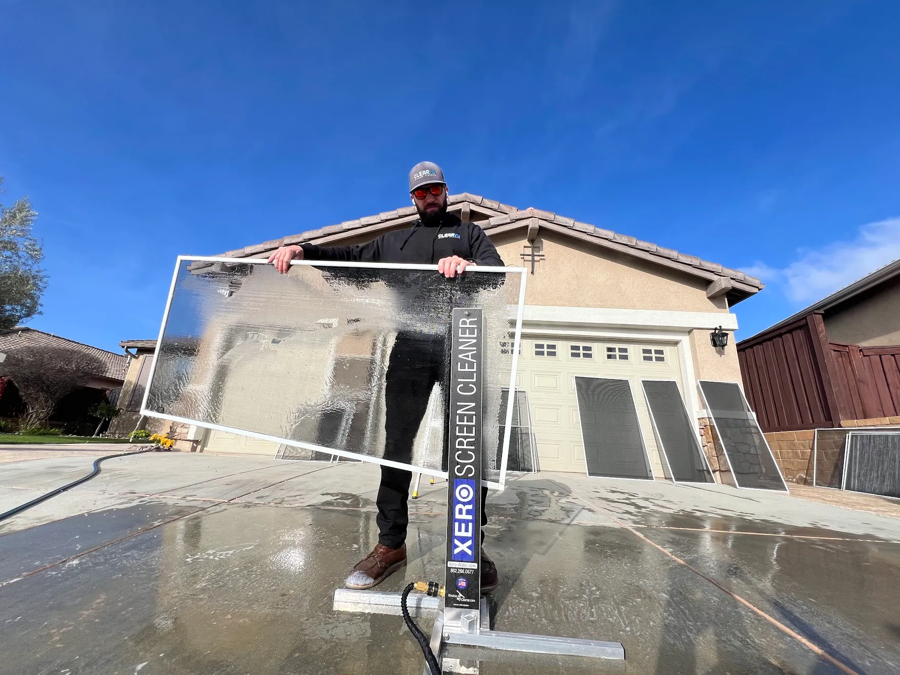 Window screens removed and hand-scrubbed during a professional cleaning service in Murrieta